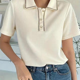 Damepoloshirt – Normal pasform – Korte ærmer – Dekorativ knapkrave