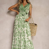 Damejumpsuit – Ærmeløs – V-hals – Bindebånd i taljen – Flagrende printet snit