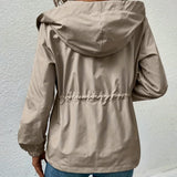 Vandtæt damejakke – Justerbar pasform – Hætte – Hoftelængde – Lommer