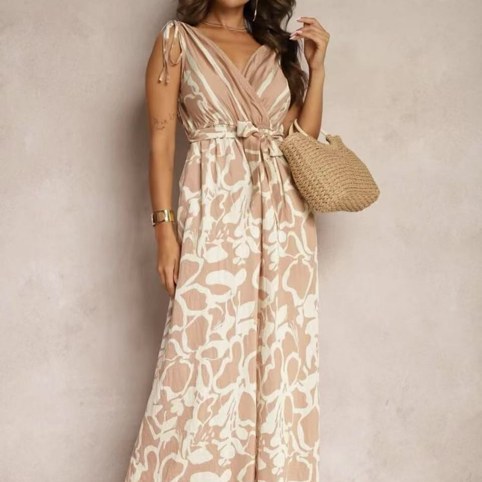 Damejumpsuit – Ærmeløs – V-hals – Bindebånd i taljen – Flagrende printet snit