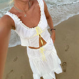 Damesæt i to dele – Tanktop med blondedetaljer – Højtaljet midi-nederdel med svaj