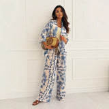 Damesæt i to dele – Afslappet pasform – 3/4-længde åben top – Blomstrede lange bukser