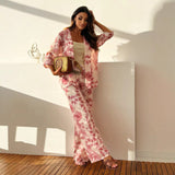 Damesæt i to dele – Afslappet pasform – 3/4-længde åben top – Blomstrede lange bukser