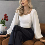 Dametop med lange ærmer – Slim fit – Strækbart stof – Firkantet halsudskæring – Pufskuldre