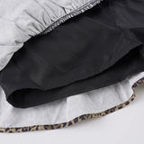 Kort nederdel med leopardprint og flæset blondesløjfe