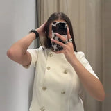 Dametøj – Kortærmet, knappet cropped jakke – Skræddersyede bukser med brede ben