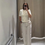 Dametøj – Kortærmet, knappet cropped jakke – Skræddersyede bukser med brede ben