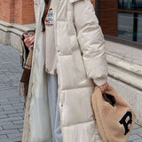 Varm, moderne og praktisk dunfrakke til kvinder