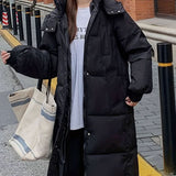 Varm, moderne og praktisk dunfrakke til kvinder