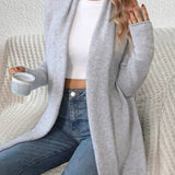 Mella - Luksuriøs strikket jakke med høje detaljer.