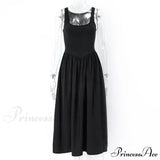 Ærmeløs trapez-midikjole med rund hals, A-snit, ideel til sommer, afslappede strandfester eller clubbing.