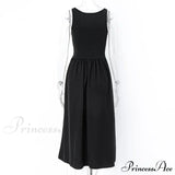 Ærmeløs trapez-midikjole med rund hals, A-snit, ideel til sommer, afslappede strandfester eller clubbing.