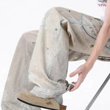 Højtaljede, vide tie-dye jeans