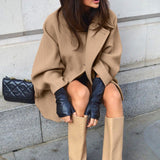 Frakke i uldblanding med flagermusærmer