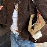 Minimalistisk cardigan med lange ærmer og knapper