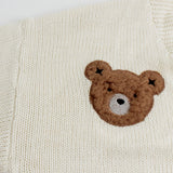 Kort vest broderet med bjørne