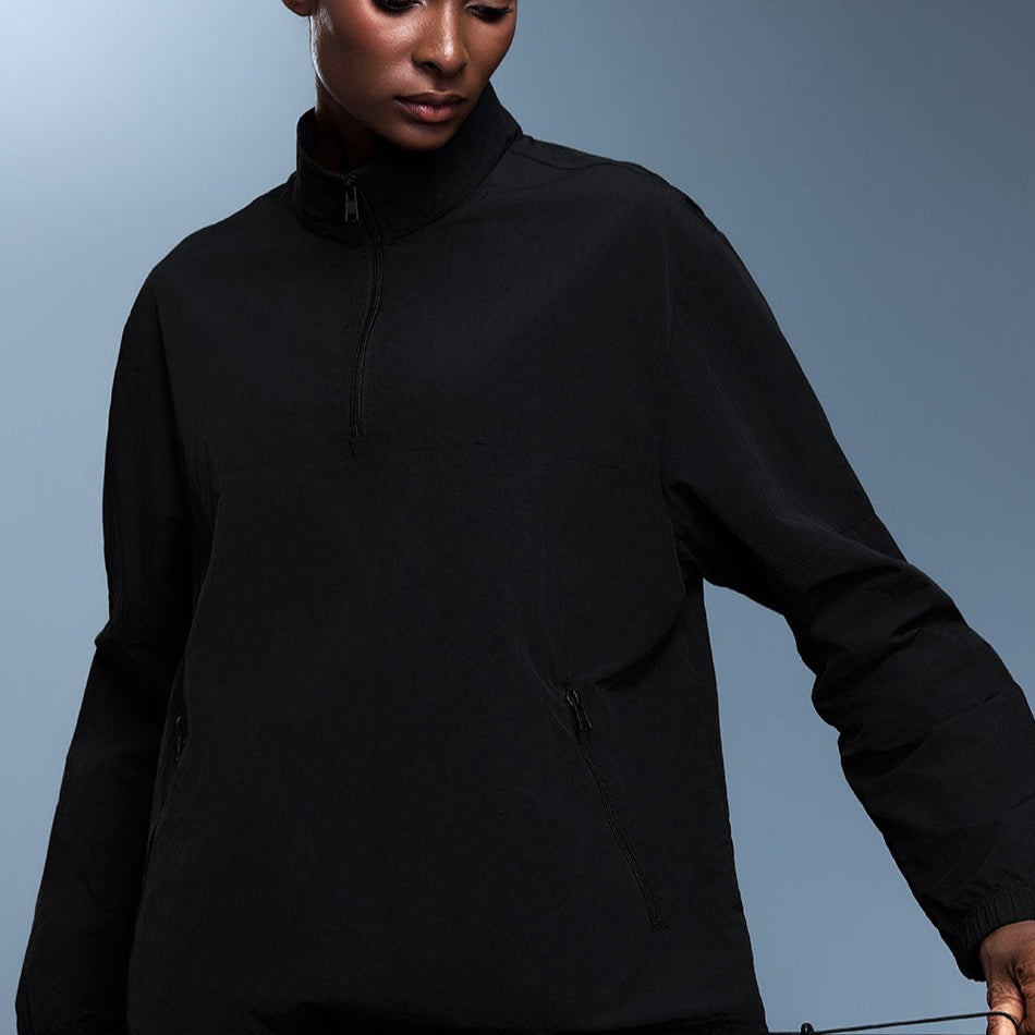 Løstsiddende, ensfarvet sports-sweatshirt med halv lynlås