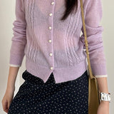 Let strikket uldcardigan med blondekrave fra Peter Pan