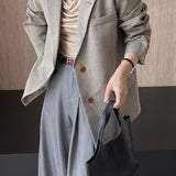 Oversized spættet blazer med knæ