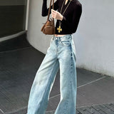 falmede, vide, slidte jeans