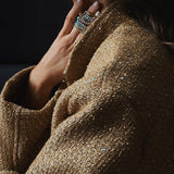 Paillettejakke med høj krave og lommer