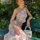 Ærmeløst sæt med én skulder i to dele, lyserødt og lilla blomsterprint