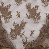 Kort, transparent cardigan med snørebånd og sløjfe foran