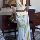 Sexet printet maxinederdelsæt med tætsiddende ryg og åben ryg