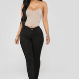 Højtaljede hvide skinny jeans