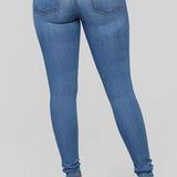 Højtaljede hvide skinny jeans