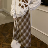 Vintage højtaljet trapeznederdel med slids