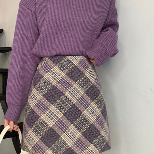 Højtaljet uldternet A-formet nederdel