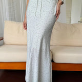 Asymmetrisk maxi havfrue-nederdel med polkaprikker