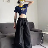 Afslappede cargobukser med atletisk elastisk linning