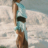 Asymmetrisk sæt med polkaprikker