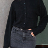 Kort vest med lange ærmer