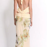 Sexet printet maxinederdelsæt med tætsiddende ryg og åben ryg