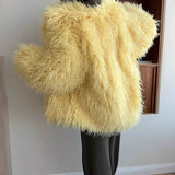 Løstsiddende, varm og tyk frakke i blød og luftig kunstpels