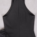 Sort asymmetrisk aftenkjole med mesh-flæser