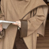 Asymmetrisk frakke med sjalkrave og farveblokke