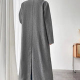 Minimalistisk lang uldfrakke