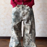 Vide jeans i hiphop-stil med camouflagevask.