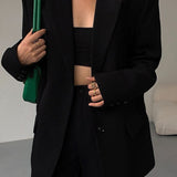 Afslappet sort blazer i retrostil