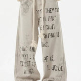 Abrikosfarvede denimjeans med lige ben og graffitiprint