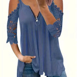 Lotte - Bluse med lynlåslukning og usædvanlige skuldre