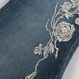 Vintage bootcut jeans med plantebroderi