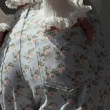 Lyseblå jeans med blomsterprint, højtaljede og vide ben