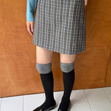 Højtaljet trapeznederdel med vintage-ternet mønster