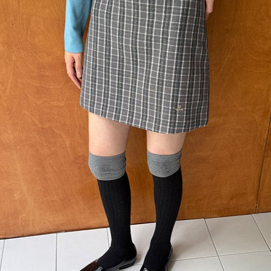 Højtaljet trapeznederdel med vintage-ternet mønster