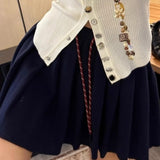 Plisseret mini-nederdel i strik